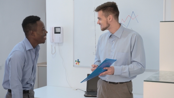 Businessman Talking In Office