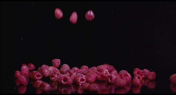 Fresh Raspberries Isolated On Black Background alt