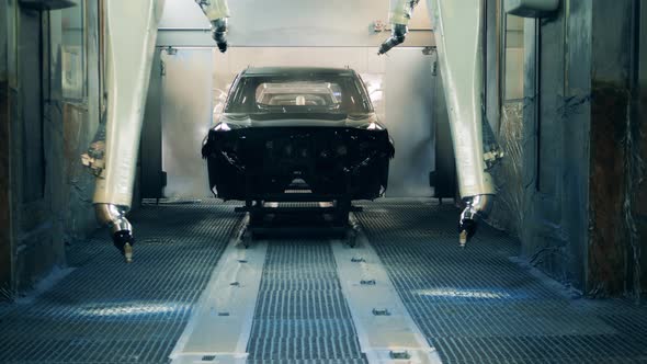 Robotic Devices Are Galvanizing an Automobile Carcass alt