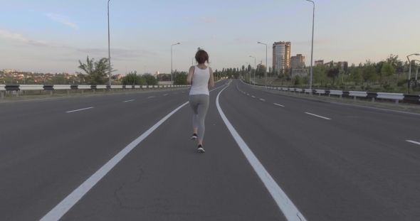 a Girl While Jogging In Park