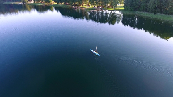 People Travel In Tourist Boat Over Lake