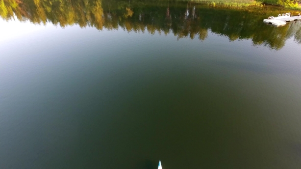 People Travel In Tourist Boat Over Lake