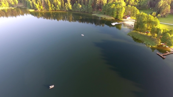 People Travel In Tourist Boat Over Lake