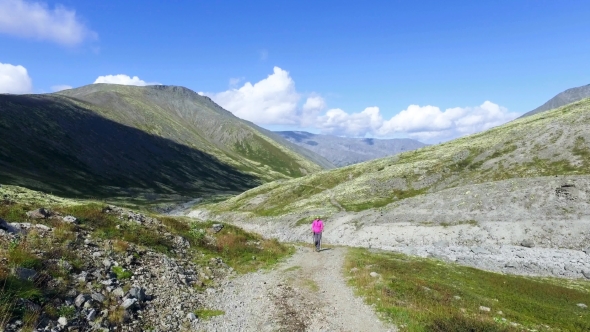 Woman Hiker Walking During Trekking