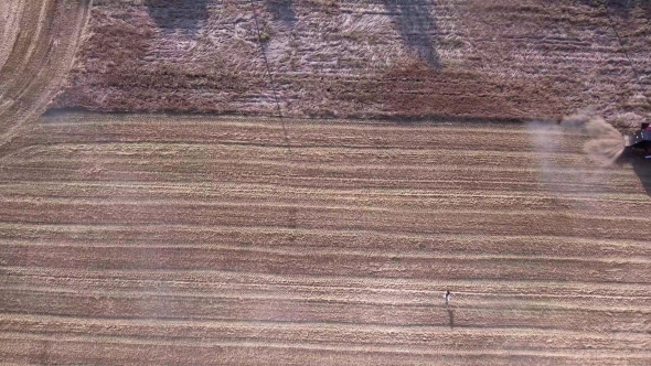 Harvester Working In The Fields