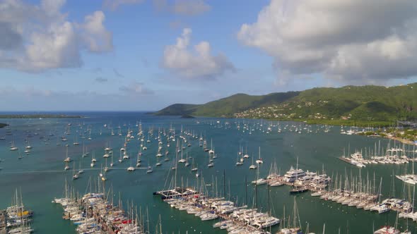 Aerial of boats moored at marina harbor in sea, Le Marin alt