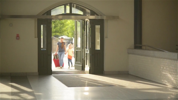 Smiling Family With Children Comes To Airport, Young Mother, Father And Kids Going For His Train At alt
