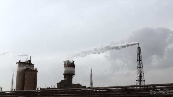 Power Station Smoking On Cloudy Sky