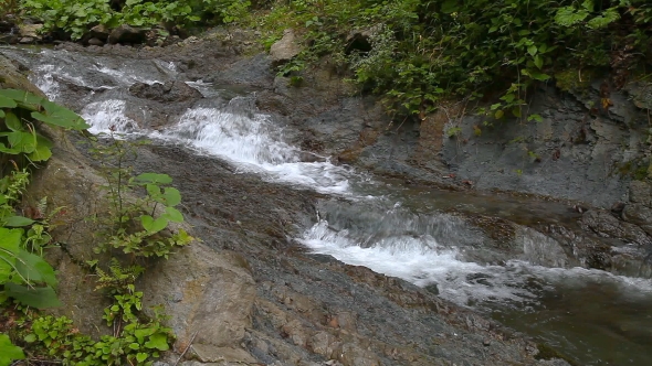 Strong Mountain Stream Flowing Over Rocks