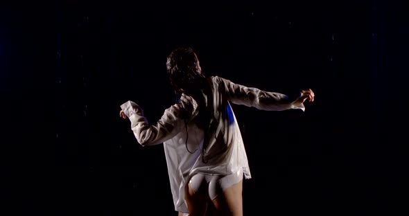 The Figure of a Beautiful Sexy Girl in a White Shirt and White Underwear. She Stands with Her Back alt