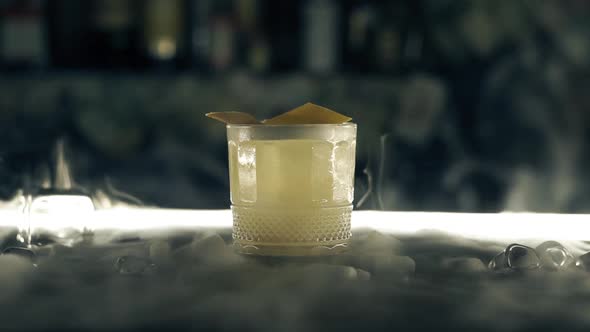 Cocktail with Dry Ice on the Bar