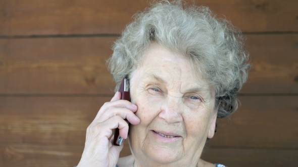 Elderly Woman Talking On The Mobile Phone