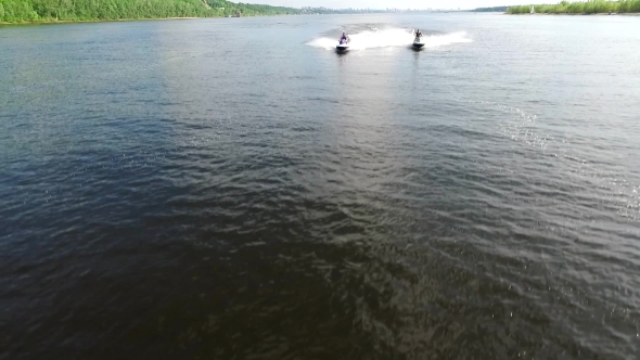 Two Guys On Jet Skis