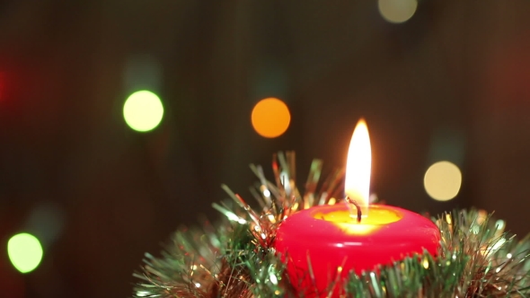 Burning Christmas Candle.