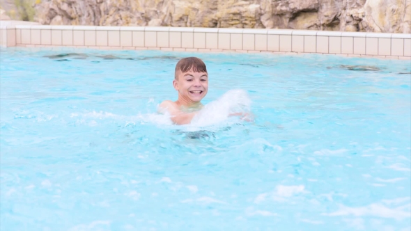 Happy Boy In Pool