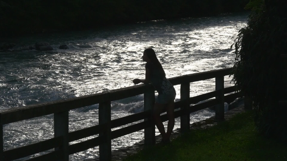 Girl Near The Mountain River