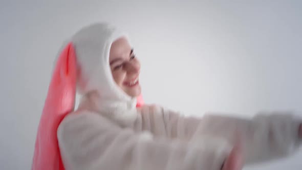 Portrait of a young cute girl in a beautiful hare costume alt