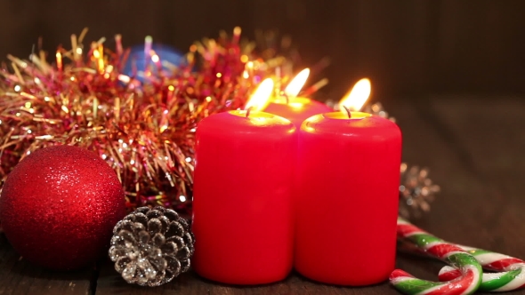 Christmas Decorations. Burning Candles And Toys