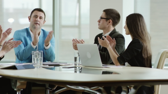 Colleagues Applauding The Boss