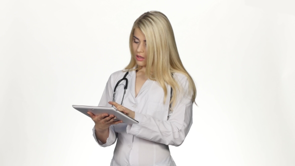 Medical Doctor Working With Laptop. White alt