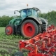 Tractor Pulls On The Field Cultivator: Which Cuts The Weeds - VideoHive Item for Sale