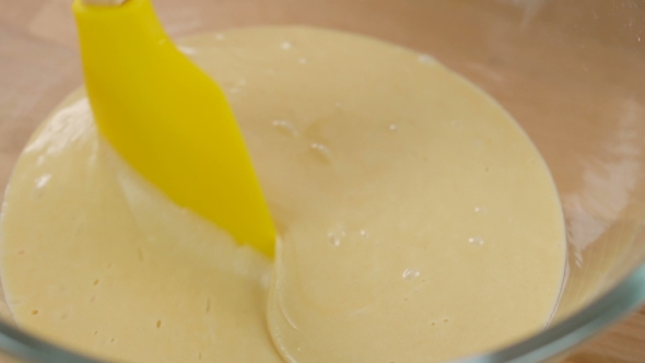 Mixing Cream And Egg For Cooking Dessert