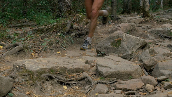Legs Male Athlete Running From Mountain
