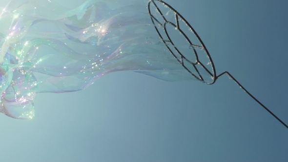 Create a Whimsical Bubble With The Device. Bubbles Flying In The Sky.
