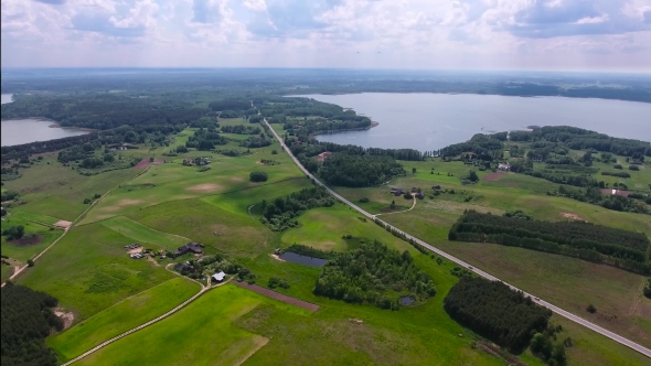 Road In The Land Of Fields And Lakes