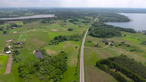 Road In The Land Of Fields And Lakes