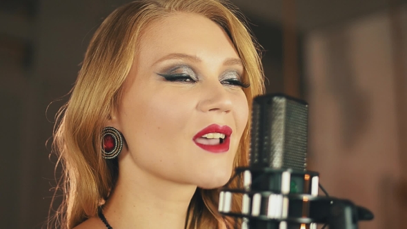 Vocalist With Red Lips Make Up Perform At Microphone. Retro Style alt
