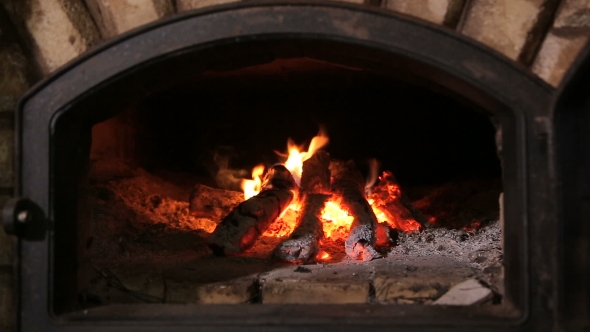 Firewood Burning In The Fireplace alt