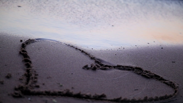 Heart Drawn Jn Beach Sand Washed Away By Waves