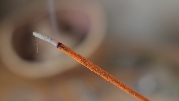 Incense Stick Burning In The Home Interior
