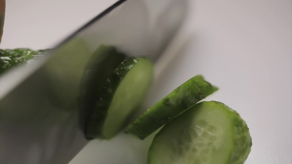 Slicing Cucumber With Knife