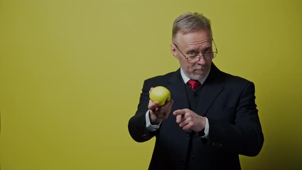 Businessman Pointing on Apple alt