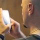Bald Person With Beard Types Text Messages On Smartphone. - VideoHive Item for Sale