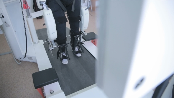 Medical Walking Robot. Rehabilitation, Rehab, Remediation For People With Feet Disease. alt