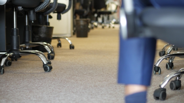 Male Legs In a Suit And Shoes Going Away, Office Background, alt