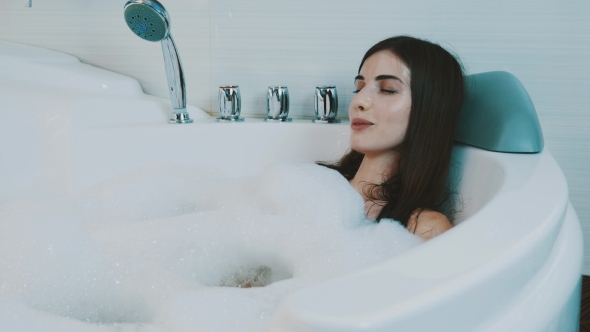 Girl Petting Herself In Bathtub Full Of Foam, Stock Footage | VideoHive