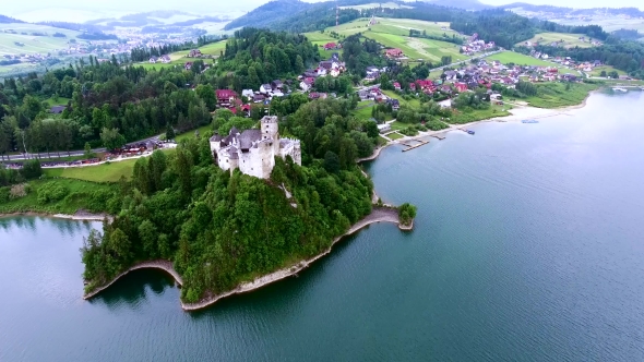 Aerial View Of Castle On Lake Bank