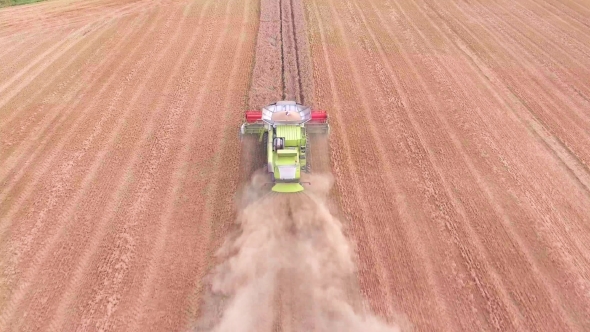 Harvester Working In The Fields