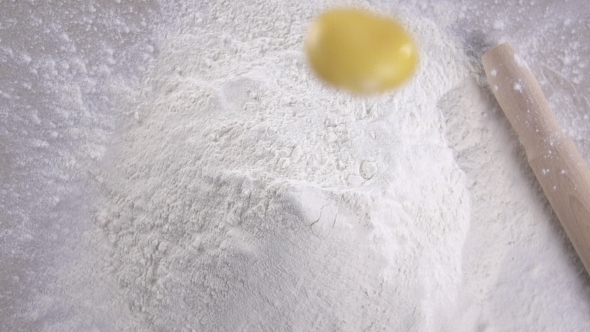 Yolk Falls Into The Flour. Food Blog, Flour Products.