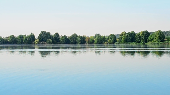 Calm River In Summer With Green Trees