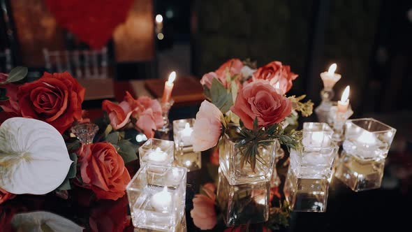 Close Frame of the Perfect Decor a Table Decorated with Pink Red Roses and Candles alt