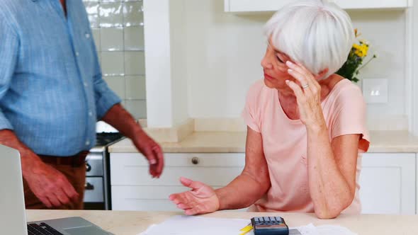 Elderly Couple Arguing About Money alt