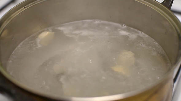 Cooking Dumplings, Put To Boil In a Pan Of Hot Water On The Stove