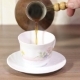 Woman Pouring Milk To Cup Of Espresso Coffee.  - VideoHive Item for Sale