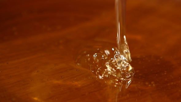 Taking Honey By Using Spoon In Wooden Bowl, Flowing Down,  alt
