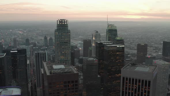 Passing Skyscrapers in Downtown Los Angeles, California at Beautiful Sunset, 